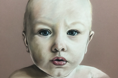alt="pastel pelcil drawing of a serious babyboy"