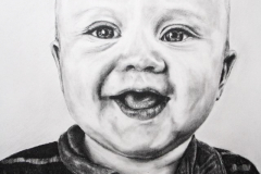 graphite pencil drawing of a baby boy portrait